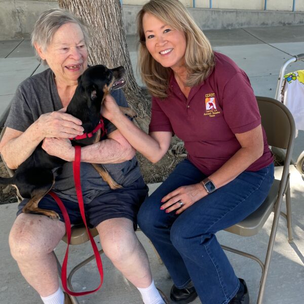 CEO Naomi Tobias with at Emergency Animal Shelter in Tehachapi, CA with Pet Owner who evacuated due to Borel Fire.