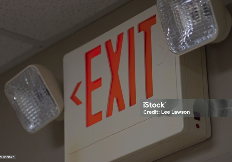 Emergency exit sign with flood lights