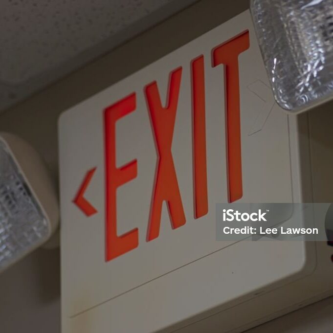 Emergency exit sign with flood lights